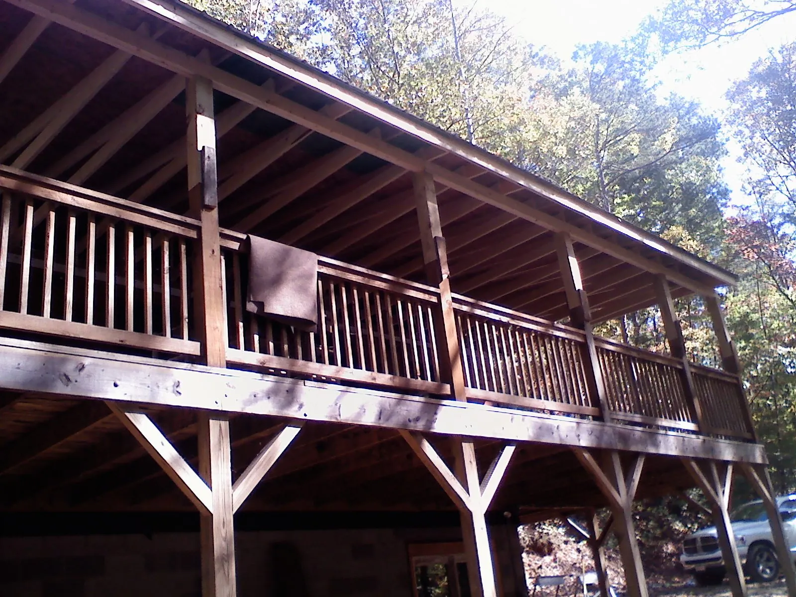 Timber framing under a new elevated porch and deck — Roof Leak Repair in East Syracuse by Roofing Brothers